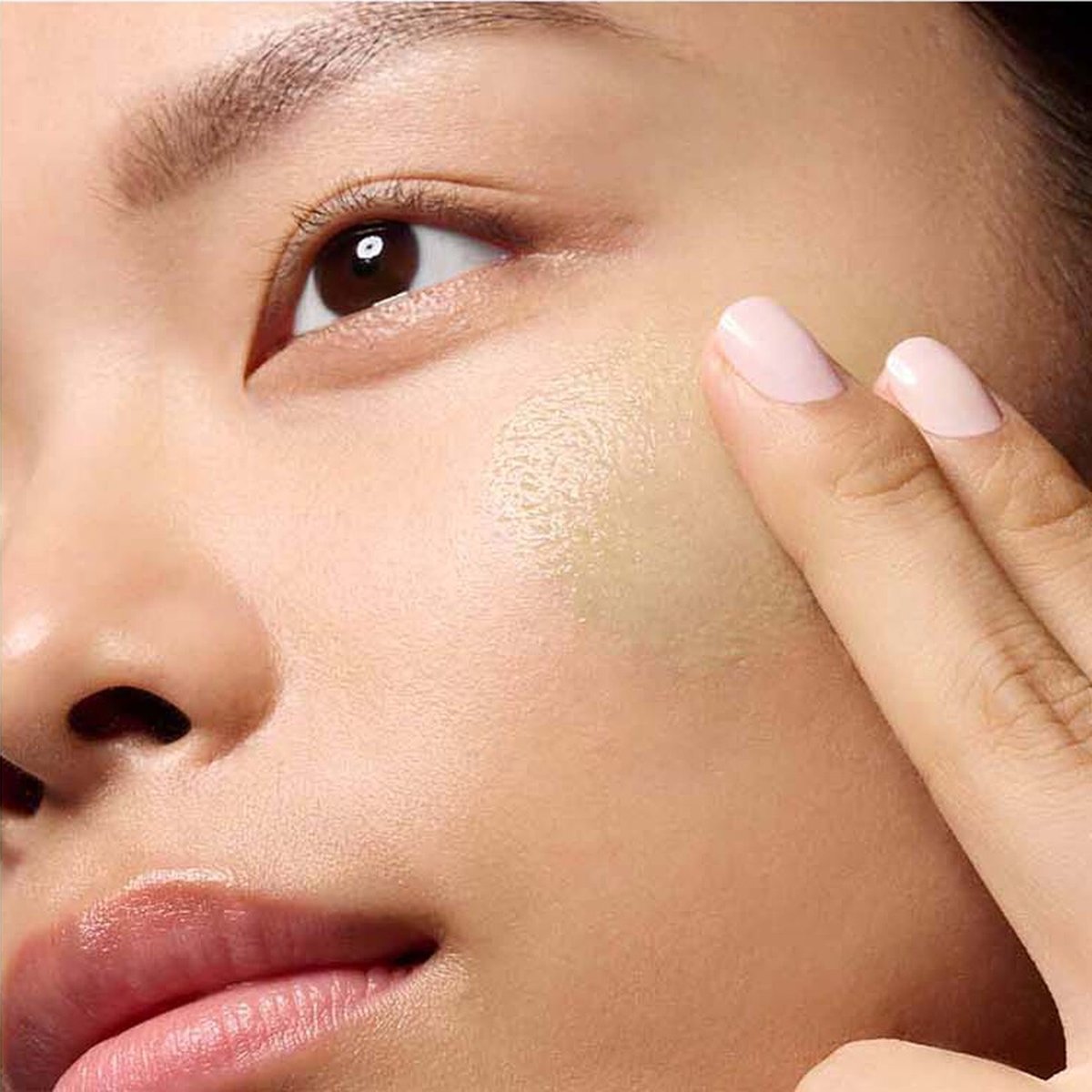 Serum pressed onto the cheek